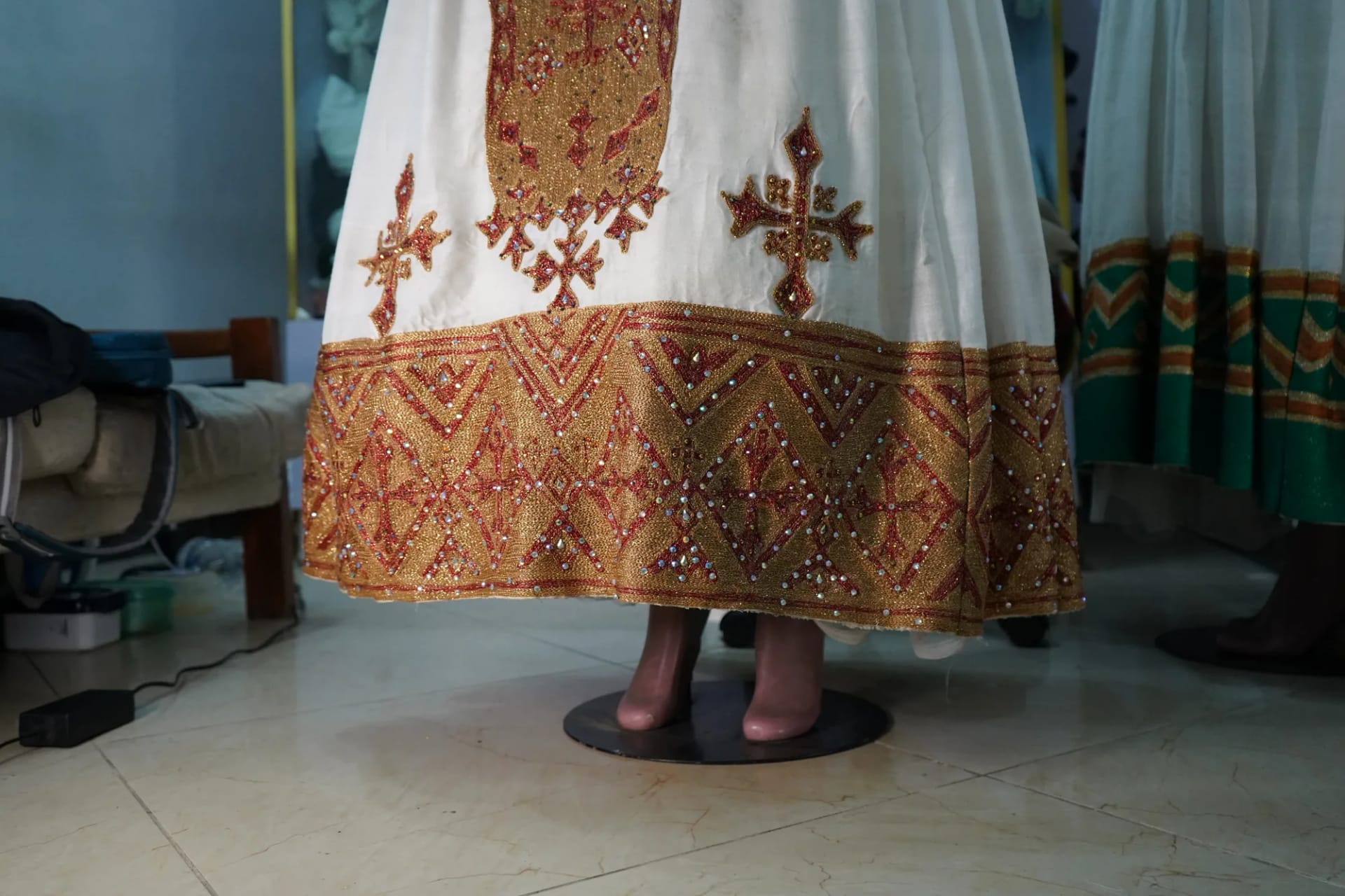 Hand woven habesha kemis decorated with golden woven embroidery, Cotton Wool fabric, Detail — Shirib Shema
