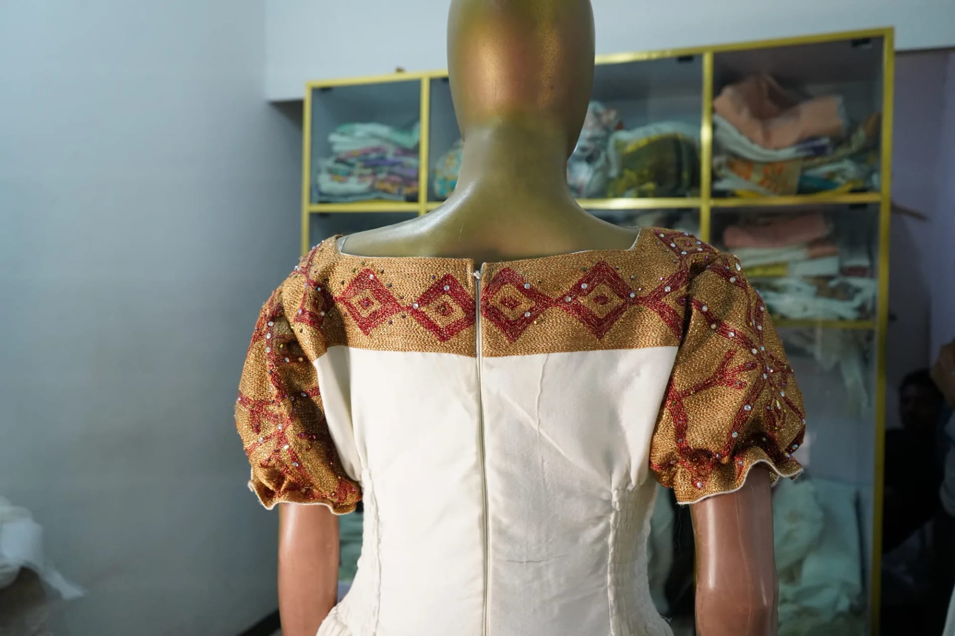 Hand woven habesha kemis decorated with golden woven embroidery, Cotton Wool fabric, Worn — Shirib Shema