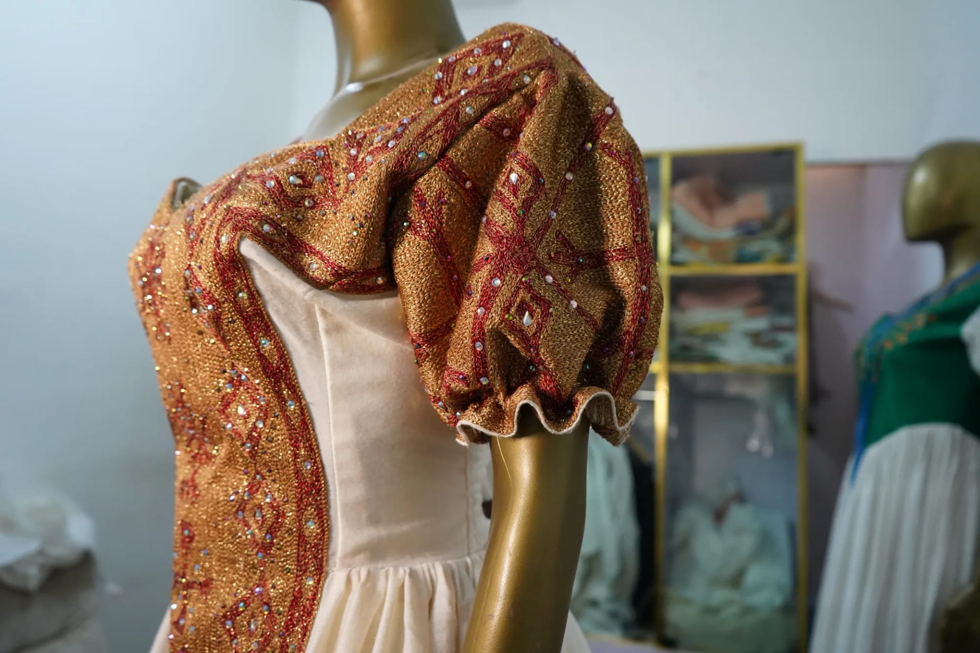 Hand woven habesha kemis decorated with golden woven embroidery, Cotton Wool fabric, Detail — Shirib Shema