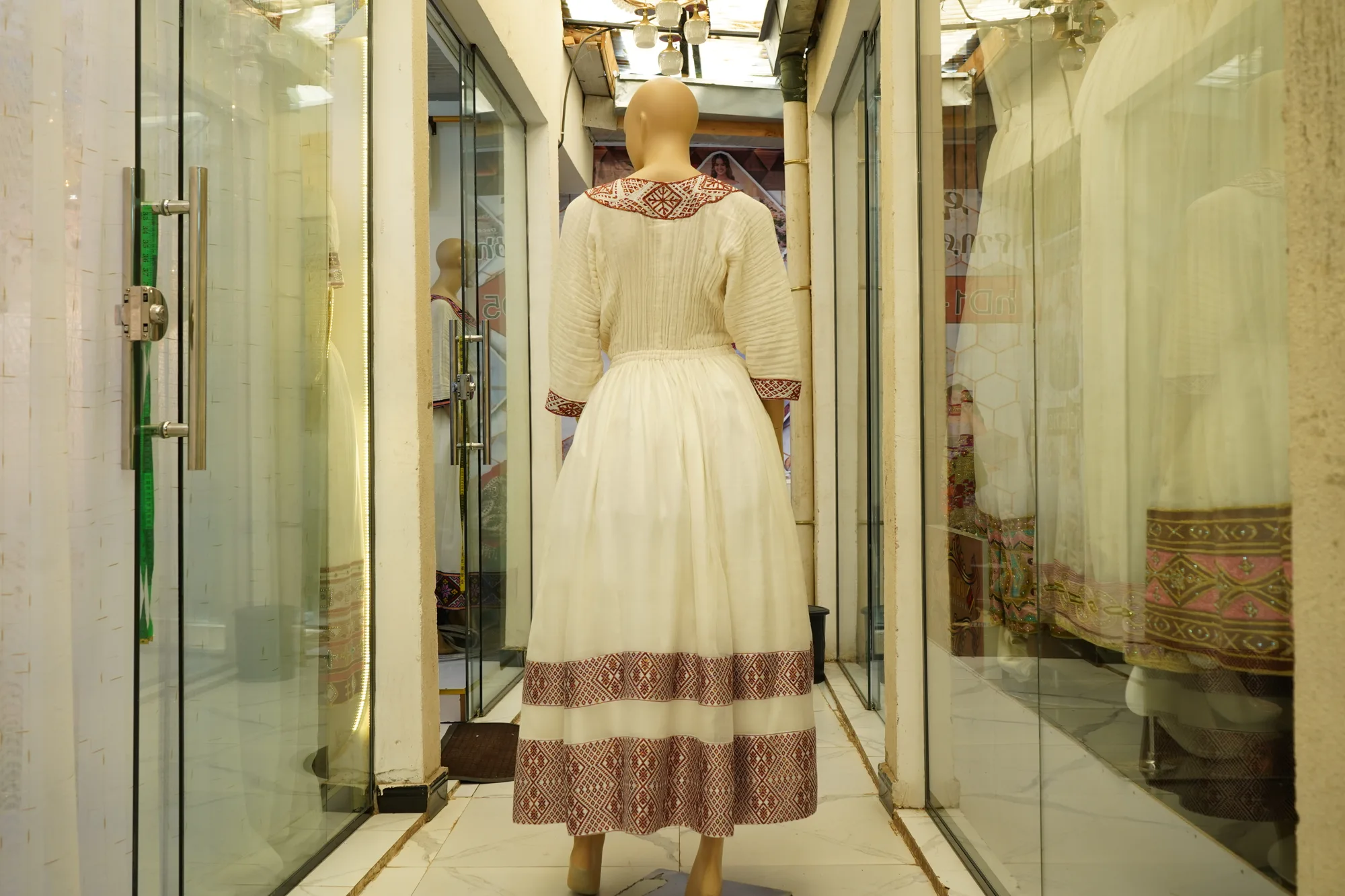 Authentic Hand-Woven Habesha Kemis with Classic Ethiopian Tibeb, Menen, Saba fabric, Back — Feker Yebahil Albasat