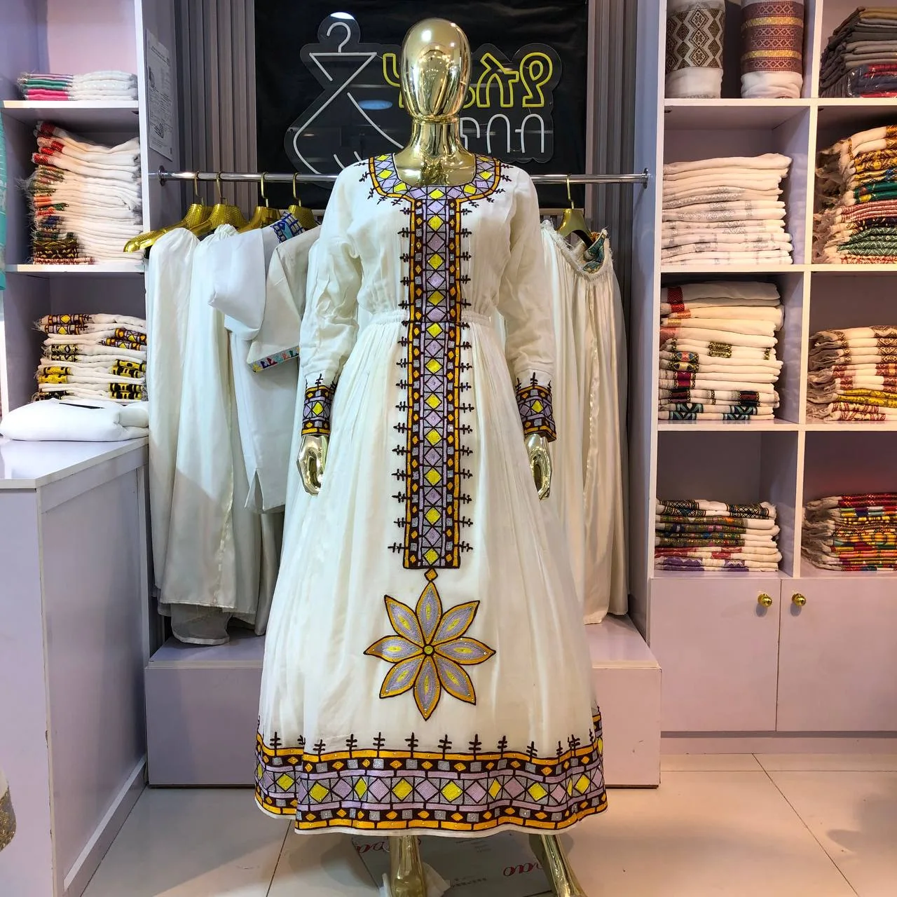 Traditional Ethiopian Habesha Kemis with Classic Gold Tibeb, menen ,Saba fabric, Front — Halleluya Tibeb
