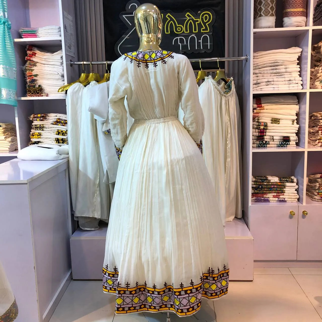 Traditional Ethiopian Habesha Kemis with Classic Gold Tibeb, menen ,Saba fabric, Back — Halleluya Tibeb