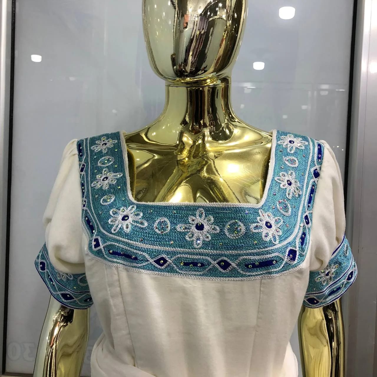 Custom Ethiopian Habesha Kemis with Elegant Handcrafted Tibeb, Menen, Fetil, Tilf fabric, Back — Elabem Design