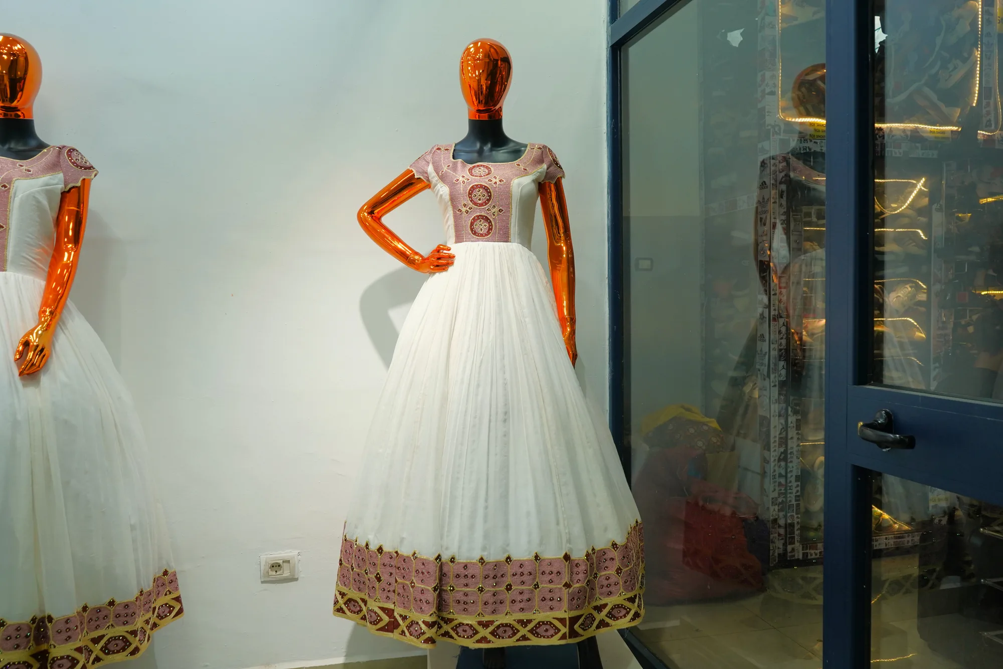 Elegant White Habesha Kemis with Rose Gold Tibeb, Menen fabric, Front — Sara tibeb